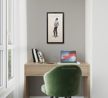 Charger l'image dans la galerie, Home office with a desk, laptop, and green chair against a gray wall with a framed picture of an elegant standing tall man with his hands both resting on the top of a cane.
