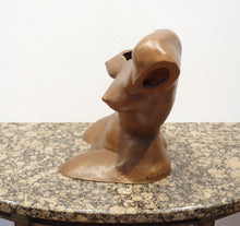 Laden Sie das Bild in den Galerie-Viewer, Terra-cotta hollow sculpture of a woman's torso sitting on a granite table, side view from a little above the art
