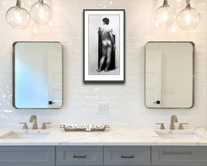 digital print of standing nude man's backside is simply framed for this 2-person bathroom counter