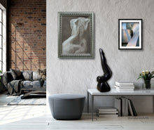 將圖片載入圖庫檢視器 Modern living room with gray sofa, ottoman, and wall art.
