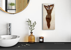 This small bathroom sized bronze relief of a woman's back with Bob Fosse like spread fingers gathered over her shoulders.  The art really adds style and personality to this minimalist bathroom.