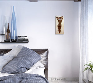 This masculine bedroom of blues, browns, and greys is enhanced by the addition of this classical feminine nude figure sculpure hung on the wall.