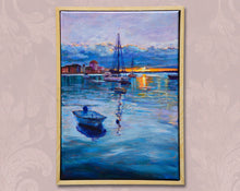 Laden Sie das Bild in den Galerie-Viewer, Framed painting of a harbor scene with boats and buildings on a wall.
