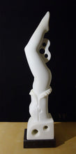 Laden Sie das Bild in den Galerie-Viewer, White marble abstract female figure sculpture on a black background, diver as enters water with a splash
