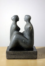 Load image into Gallery viewer, Abstract sculpture of two figures on a white background, female facing right, the male facing left
