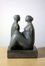 Load image into Gallery viewer, Gray stone sculpture of two figures on a white background
