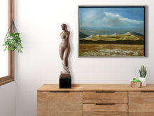 Laden Sie das Bild in den Galerie-Viewer, Wooden sideboard with a statue, potted plant, and framed landscape painting.  Both the stone carving sculpture and the oil painting are by Ukrainian artist Vasily Fedorouk.
