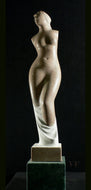 Statue of a nude female figure of Greek goddess Venus on a dark background