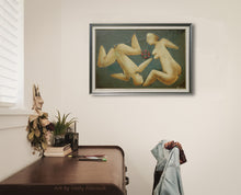 Laden Sie das Bild in den Galerie-Viewer, Framed artwork of two primitive abstract nude figures on a wall above a desk in a home office.
