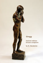 Load image into Gallery viewer, Man&#39;s right side, sculpture of standing nude man who only wear&#39;s a tank top and pulls it up to his face, bronze art

