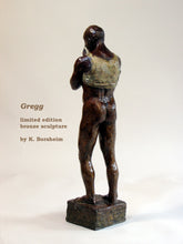 Load image into Gallery viewer, Back view of standing man nude from the waste down as he pulls up the front of his shirt to wipe his brow. limited edition bronze sculpture for tabletop
