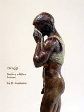 Cargar imagen en el visor de la galería, Profile of half nude man pulling shirt to clean the sweat out of his eyes.  limited edition bronze sculpture detail
