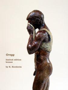 Profile of half nude man pulling shirt to clean the sweat out of his eyes.  limited edition bronze sculpture detail