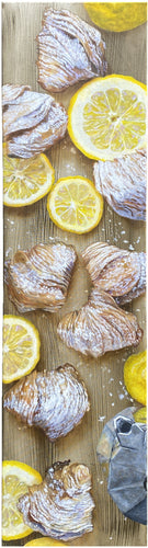 Tall vertical painting of lemon slices with the Italian pastry called sfogliatella.  the food sits on a wooden cutting board and you see a Moka Italian coffee maker.  Painting is of the aerial view of this composition.  80 x 20 cm by artist Kelly Borsheim