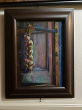 Cargar imagen en el visor de la galería, Framed painting of a decorative garlic braid hanging on a wooden window frame and shutters with a textured wall background, dark wood frame
