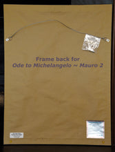 Load image into Gallery viewer, image of the back side of the frame... closed with acid-free paper to protect from dust, wire hanger, and information about the glass.
