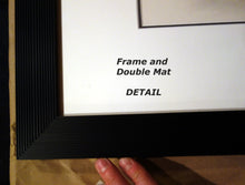 Load image into Gallery viewer, Better lighting on the frame to show the parallel ridges in the black frame.  Also shows the double mats, thin black inner mat with a wide white mat between that and the frame
