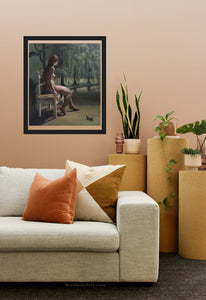 Living room with a couch, decorative pillows, and a framed painting on the wall.