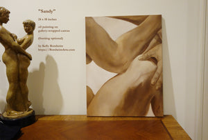 Painting titled 'Sandy' by Kelly Borsheim next to a classical statue on a wooden bedroom dresser.