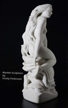將圖片載入圖庫檢視器 Marble sculpture of a nude figure over shapes inspired by the ocean by Vasily Fedorouk on a black background.
