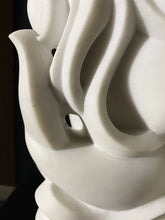 將圖片載入圖庫檢視器 Close-up of a white polished marble sculpture with wavy design showing holes cut into the stone.
