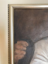 Laden Sie das Bild in den Galerie-Viewer, A close-up of a framed painting showing part of a dark brown and gray scene with a pale white area, set in a metallic silver frame against a light beige wall.
