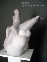 Cargar imagen en el visor de la galería, A dolphin seems to dive into a CLOUD while the god Apollo sits on top of him for the ride.  Mixed media sculpture of Portuguese marble with gold by the late Ukrainian-American artist Vasily Fedorouk

