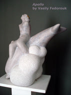 A dolphin seems to dive into a CLOUD while the god Apollo sits on top of him for the ride.  Mixed media sculpture of Portuguese marble with gold by the late Ukrainian-American artist Vasily Fedorouk
