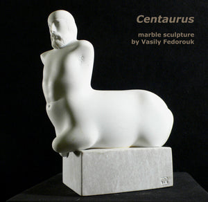 Artist self-portrait of the mythological man and horse combined... a centaur.  Beautifully carved from white marble, this tabletop statue is a gem!