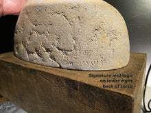Carica l'immagine nel visualizzatore di Gallery, Stone sculpture with the artist Vasily Fedorouk's signature and logo on the lower right back of the torso, held by a hand.
