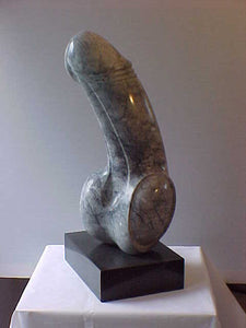 Another view of the erect penis bathroom sculpture in grey marble.  Artwork made by Vasily Fedorouk.