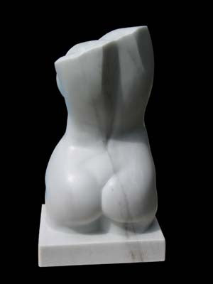 Back view of contemporary stone carving :  a marble torso of a woman curvaceous butt and angled shoulder blades, art sculpture by Kelly Borsheim