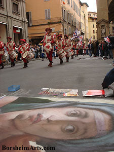 Florentine parades are a joy to watch, such costumes, such flare! In the foreground artist Kelly Borsheim is painting a large head of a syble by Michelangelo on the Sistine Chapel.  Florence Italy