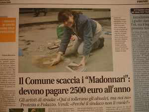 Artist Kelly Borsheim was interviewed and photographed by a journalist covering the street art tax protest, Florence Italy 2007