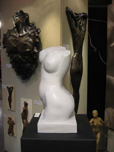 The art booth exhibit of bronze nudes of men or women, as well as this white marble nude torso of a woman.  Art by Kelly Borsheim