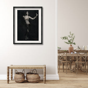 This black and white charcoal drawing with subtle touches of color figure belly dancer looks great in the foyer or entry room.  Seen in the background is a contemporary dining room.