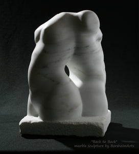 A female torso goes back to back with her partner male in this marble sculpture about vulnerability and love and support of one another, great wedding or anniversary gift art investment