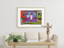 Load image into Gallery viewer, The bronze figure of the dancing little mermaid looks great on a coffee table with an artsy picture of Burano, Venice, Italy (Venezia, Italia) ... keeping an ocean or sea theme in the living room decor.
