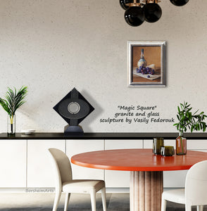 Still life painting of Italian food staples look great in this dining room.  Shown also in the black granite stone sculpture with glass by Vasily Fedorouk.