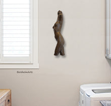 Cargar imagen en el visor de la galería, Nude sculpture also enhances the room where one washes clothes!  Shown here is a female torso bronze sculpture mounted on the wall above the washing machine.
