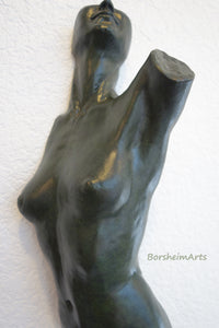 another point of view of the detail of the body of a woman who is reaching up and looking upwards.  this is the dark green patina choice. art by Kelly Borsheim