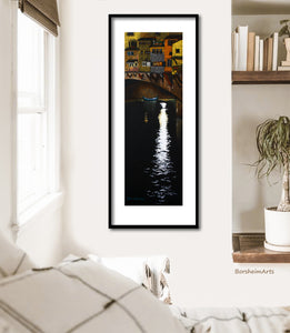 Offset mat and thin black frame really enhance this pastel drawing print of the buildings on the Ponte Vecchio old bridge in Italy at night with a turquoise boat floating parked on the Arno River... shown here in a boho bedroom scene, art for travel lovers