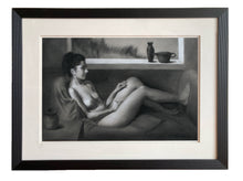 Cargar imagen en el visor de la galería, The original charcoal and white pastel drawing in its double mat and black lined frame, Daydreaming of Yesterday, a nude woman sitting on a couch lost in thought.
