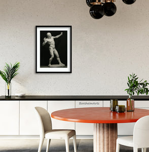 The Ecorche Archer is framed and matted in this dining room space, the black and white complimenting the room decor.