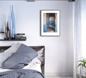 The blue and white walls in this bike and foot path in Essaouira Morocco lends soothing restful colors to this blue bedroom scene.  Fine art prints available of the original sold drawing art