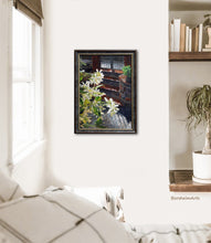 Load image into Gallery viewer, This original framed oil painting of backlit jasmine flowers by an gate and stone walls looks great in this Boho bedroom scene.
