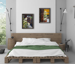 Two paintings of jasmine are hung at different levels to add interest to this contemporary bedroom scene with green accents.