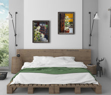 Carica l&#39;immagine nel visualizzatore di Gallery, Two paintings of jasmine are hung at different levels to add interest to this contemporary bedroom scene with green accents.
