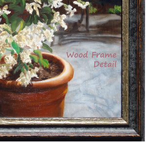 Detail of lower right corner of frame showing the wood frame in three main textured colors:  golden bronze, grey, and a reddish brown color, perfect accents to the Tuscan home scene in the art.