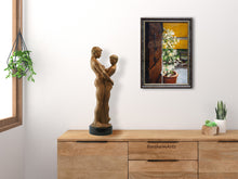 Load image into Gallery viewer, warm colors of browns, golds, and green make this minimalist bedroom feel more cheerful.  Bronze Sculpture Together and Alone sits on the dresser, while the Keys to La Casa, an original oil painting of home and jasmine flowers, with keys hanging from the rustic old wooden doors of a Tuscan home, graces the wall.
